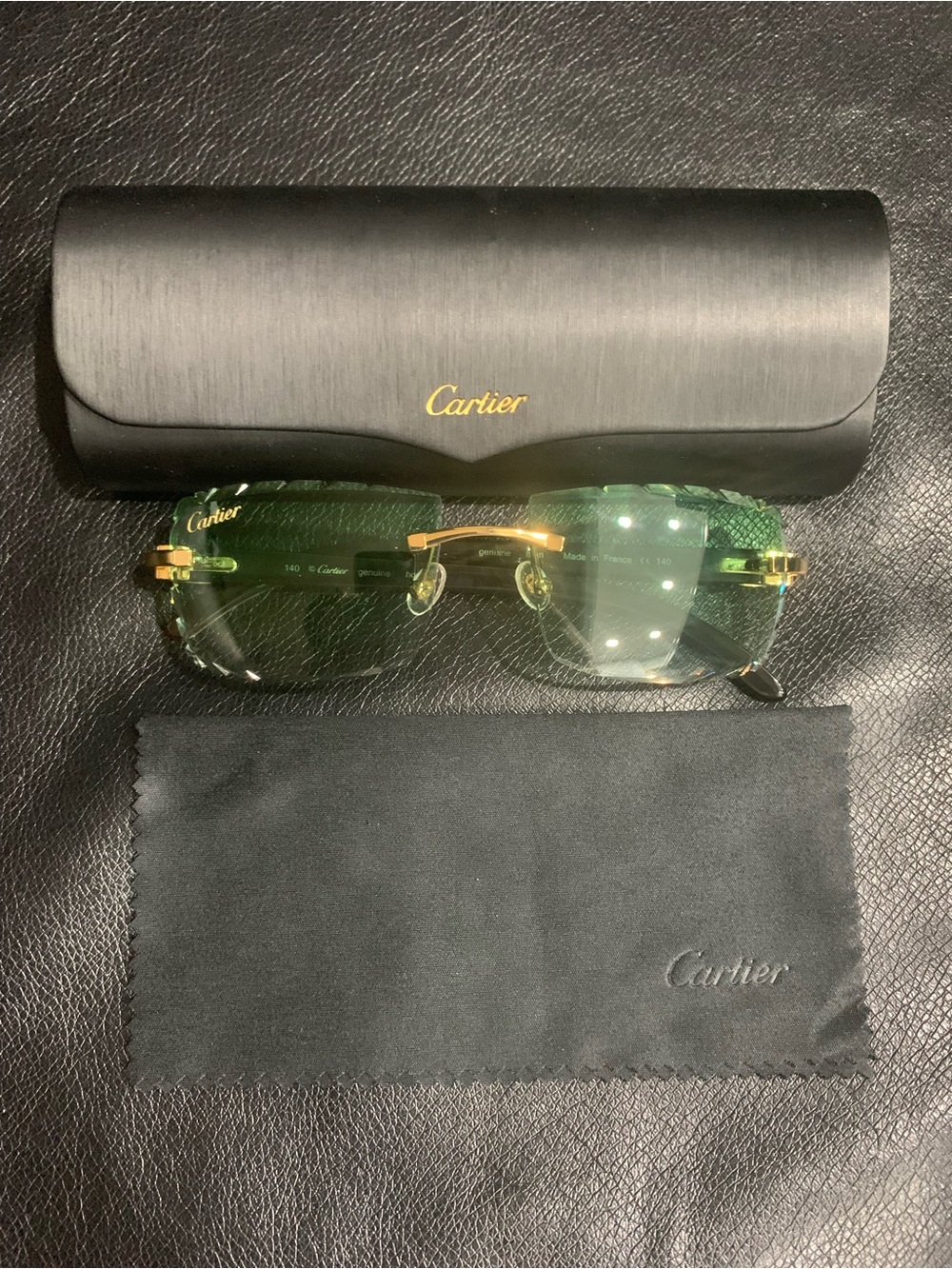Cartier Men’s Green Lens Rimless Sunglasses with Gold Accents